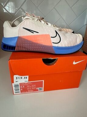 Nike Training Shoe in Cream with Blue and Coral Accents